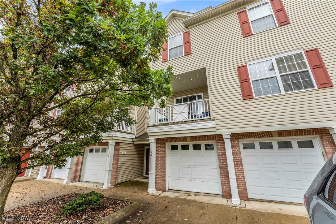 Welcome to 470 Tollis Parkway, a beautifully updated townhome that combines modern style with everyday comfort in the heart of Broadview Heights. The open main level features a stylish kitchen with seamless flow into the dining area, and a bright, airy living room with a cozy fireplace and private balcony. Upstairs, you’ll find two spacious bedrooms with ample closet space along with a vaulted primary suite offering a double vanity with sleek, modern finishes. With 2 bedrooms, 2.5 bathrooms, an attached garage, convenient second-floor laundry, and tasteful updates throughout, this home offers the perfect blend of function and contemporary design. Schedule your tour today!