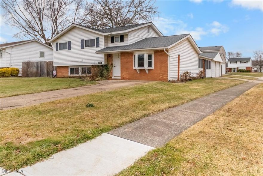 Welcome home to this charming 3-bedroom, 1.5-bath bi-level in Lorain—perfect for first-time buyers or young families ready to put down roots! From the moment you arrive, you’ll appreciate the classic curb appeal, spacious driveways, and inviting front entry. Inside, enjoy a bright, functional layout with fresh, neutral finishes and plenty of room to spread out. The open kitchen offers ample cabinet space and flows easily into the dining area—ideal for weeknight dinners or weekend hosting. Downstairs, a cozy lower-level living space creates the perfect spot for movie nights, a playroom, or home office setup. Step into the enclosed sunroom for extra entertaining space and year-round enjoyment. With comfortable bedrooms, updated baths, and a backyard ready for summer fun, this home checks all the boxes for easy living.
Schedule your private showing today—don’t miss your chance to call this one home!