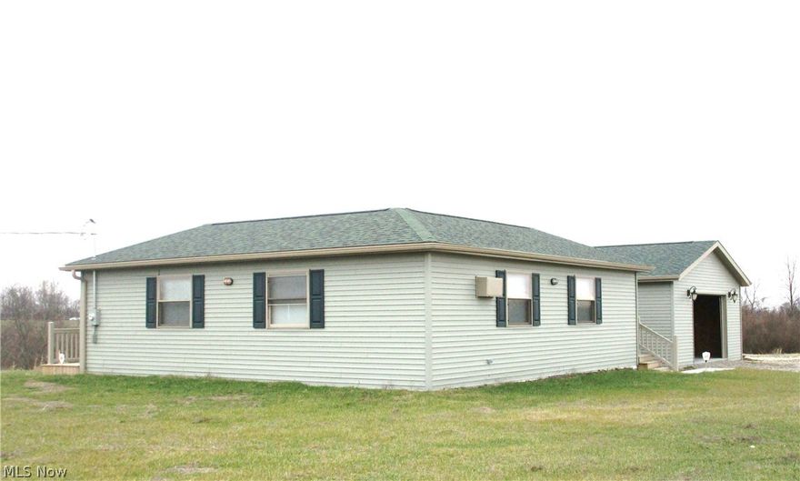 Motivated Seller! Open floor plan living in this quality built home. Home built 2016 and sits on 1.25 acres of country setting.  Survey has been completed & will be recorded for new parcel number. Owens Corning life time shingles, Simington Windows, Vinyl railing on treated wrap around deck, R19 insulation in 2x6 walls, R30 in floors and 1 foot blown in insulation in attic, 24x24 2 car garage attached to house by ramp on deck and 12x7.6 garage door.