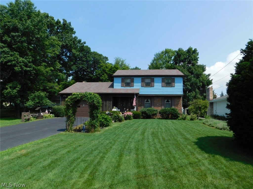 A colonial perfect for summertime living! You will love the curb appeal of this home. Exterior features include an immaculate, beautifully maintained lawn, charming landscaping and private back yard retreat!
Updated kitchen includes backsplash, copper sink and brand new dishwasher. All appliances stay! Popular commercial grade vinyl flooring in kitchen and foyer resembles wood planks. Family room with gas fireplace, custom built shelves and benches. Sunroom addition in 1986 with cathedral ceiling. solar shades and 6 sliding doors to deck. The back yard goes on forever enhanced by beautiful trees and a gorgeous 32 x 16 in-ground pool (3-8' depth) with liner, newer motor and thermostat, slide and waterfall.
Living room and dining room feature unique, rustic wood beams. New carpet on first floor. Cedar panelled walls with custom grooved trim.
Main bath on second floor was updated in 2017. Plenty of storage and there's even a laundry chute.
Basement is partially finished with living area, bedroom, full bath and kitchenette. Unfinished space includes laundry tub, washer and dryer and work bench. Furnace replaced 2010, A/C 2008, hot water tank 2016. This one definitely will not last!