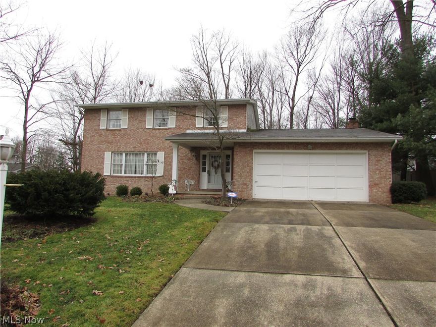 A wonderful Paul Weber built, all brick colonial in North Canton.  This lovely home has a large living room with excellent natural sunlight.  A spacious family room features a wood burning, brick fireplace.  The eat in kitchen has been updated, with a formal dining room.  Enjoy the wonderful back yard from the 18x14 Sunroom with a fireplace.  Each bedroom is spacious.  The foyer has magnificent slate floors.  There is an attached 2 car garage, patio, full basement, and so much more.