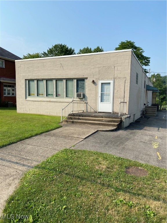 2340 Square Feet of space currently set up as 2 offices and then shop space. Full Basement for additional storage. Attached garage with loading dock potential. Space could be split into 3-4 individual users for a multi commercial set up, each having private entrances