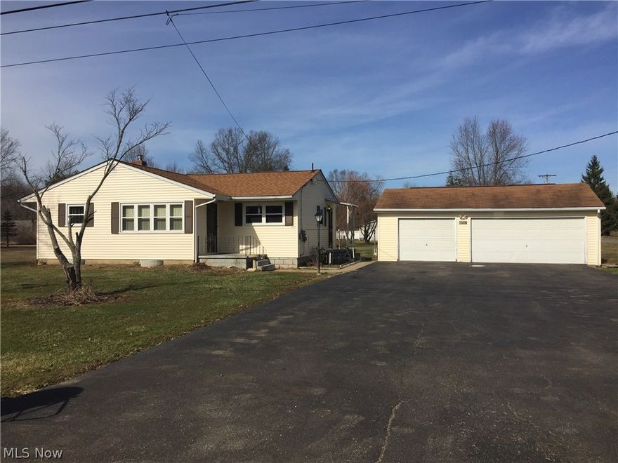 Well maintained 3 bedroom ranch. Galley kitchen. Beautiful hardwood floors. Partially finished basement.  2-3 car garage (768 sq. ft. ) paved drive, shed, corner lot. Central air. All this on over an acre lot size 201x260. Newton Falls address with Southeast schools, Paris TWP.
