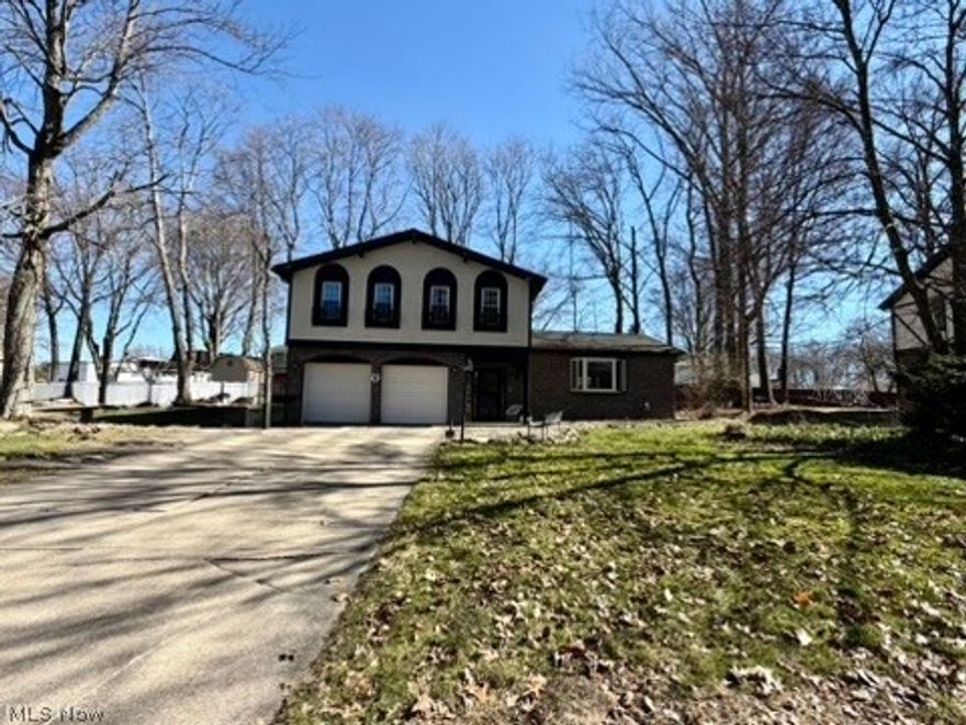 Look no further! This charming Spanish-inspired home in the highly desirable Colonial Hills neighborhood is ready for its new owner. Offering over 2,100 square feet of living space, this spacious home features 4 bedrooms, 3 full bathrooms, a 2-car garage, and a fully fenced yard. The main level welcomes you with a convenient mudroom, a large living room with vaulted ceilings, and a formal
dining room perfect for entertaining. The kitchen has full appliances, granite countertops, abundant cabinet space, and a pantry for added storage. Just off the kitchen, enjoy the beautiful sunroom with skylights, providing the perfect
space to relax and take in natural light. The first floor also includes a fully remodeled bedroom featuring an electric
fireplace along with a modernized full bathroom, offering flexibility for guests or main-level living.
Upstairs, you'll find a spacious second primary suite with his and hers closets and a private full bathroom with dual
sinks. Two additional oversized bedrooms with generous closets and another full bathroom complete the upper level.
Homes with bedrooms this spacious are hard to find.
Recent updates throughout the home include new LVT flooring through much of the home, newer carpet in the
bedrooms, updated bathrooms, updated plumbing and electrical, new light fixtures and ceiling fans, and a hot water tank
(2022), and AC (2022). Outside, enjoy the large concrete patio and new exterior drainage system (2025), new front door,
garage man door, and storm doors (2025), along with low-maintenance landscaping and more!!
This move-in-ready home truly has it all. Schedule your private showing today!