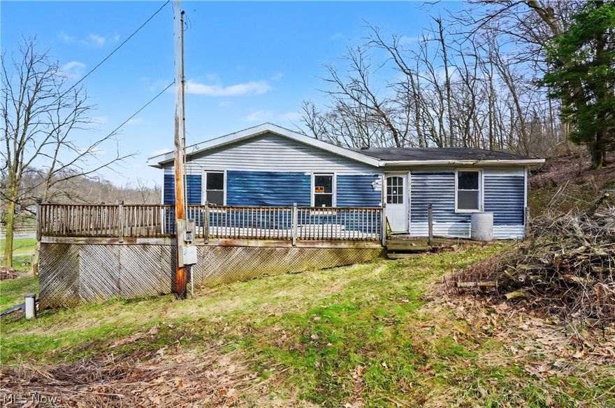 Opportunity awaits with this affordable ranch in the South Range School District! Situated on a .29-acre lot, this 2-bedroom, 1-bath home offers 960 sq ft —providing plenty of potential for renovation or investment. The property has a fairly new WELL and SEPTIC system installed. This home could optionally be torn down and a new home or garage could be built with well and septic in place.
 Ideal for investors, flippers, or buyers looking to build equity, this home is being sold as-is and priced accordingly.
Enjoy a rural setting, sitting well off the road with nice views and with convenient access to Route 14 and Salem, Boardman, and surrounding areas. Whether you’re looking for your next project or a budget-friendly opportunity, this property offers strong potential at an affordable price.