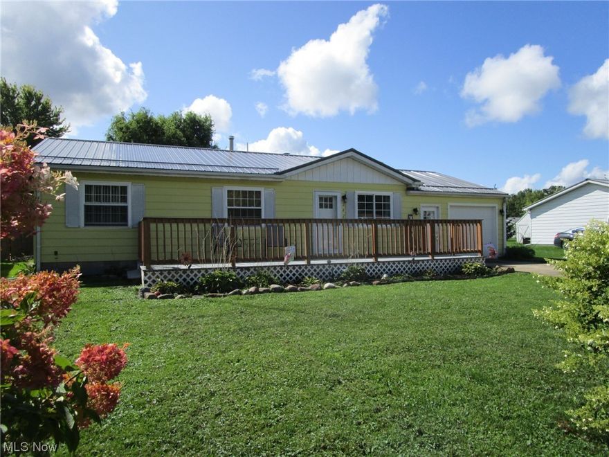 Offer deadline is 9/20/2023 at 6:30 P.M. The sunniest house on the street! Well maintained, with a brand new (2023) metal roof & an attached garage, this one won't last. The garage is extra deep with plenty of room for your vehicle, plus a work bench area in the back & some storage up top. Nicely located, on a quiet side street, you have quick access to Route 11 and you're also just minutes from shopping, restaurants, schools, the Library, the Post Office, County offices, Police and Fire Departments, Parks, dental and medical facilities, the Community Center and more! This is easy one floor living with a handy laundry room just off the kitchen, a nice big (30 x 12) freshly painted front porch for relaxing after work and a sunny back yard, great for outdoor entertaining, pets, gardening or a game of horseshoes! Enjoy grilling and evenings outside on the  24x 15 patio - a great spot for your picnic table, fire pit, hot tub, grill and canopy! This adorable kitchen offers newer cabinets, u