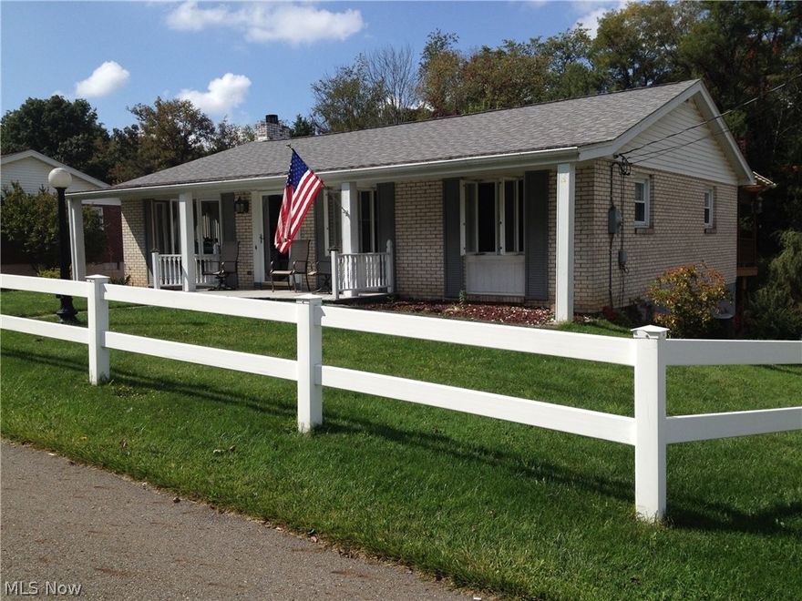 Master bedroom with master bath and Beautiful hardwood floors through out.  Huge kitchen with ceramic floor and sliding door to covered deck.  Family room features a gas fireplace.  2 car integral garage and 2 car detached with plenty of space and paved driveway.  200 amp service and newer roof. Big back yard and front yard has a maintenance free fence,