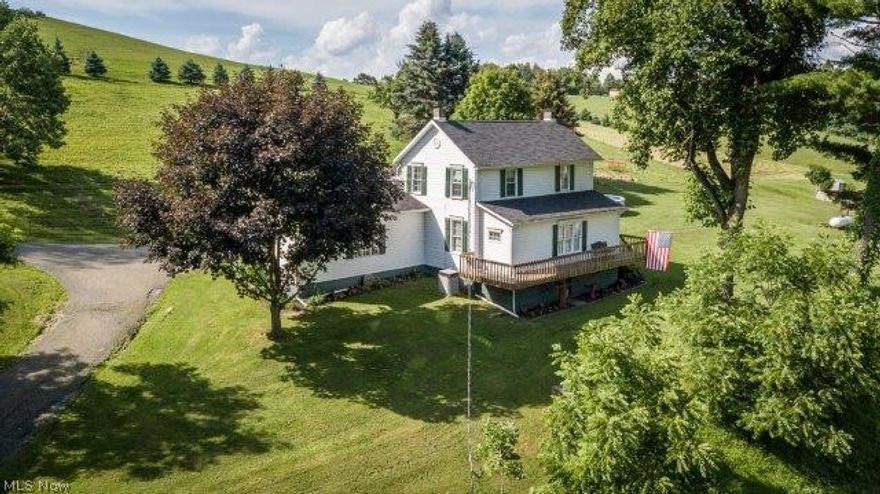 Spacious farmhouse with an eat-in kitchen, brick fireplace (not used), ample oak cabinetry with a 5-ft. island and a breakfast bar, kitchen appliances (new 2017). First floor master bedroom and first floor laundry. There are 3 rooms on the 2nd level with lots of storage space. Deck off kitchen leads out to the 12X30 above-ground oval pool (sand filtered pump and equipment 2 years old). Roof new in 2016. There is a 20X32 barn with electric (box stall for horses. Property has about 1.5 acres fenced), also there is room to park a vehicle. There are 2 water wells, one used for livestock only. Excluded from the sale: lawn ornaments, wooden wheel, 2 windmills and the deck umbrella. Carroll Co-Op is the electric supplier - monthly average $175. Propane gas monthly average is $175. This is a great home waiting for family that enjoys the outdoors.