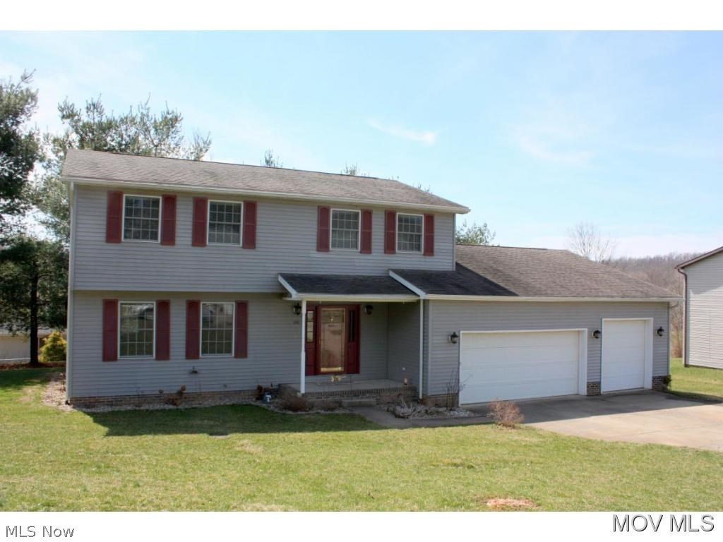 Golf course living is available at this beautifully updated two story featuring 4 bedrooms, 2.5 baths and 3 car garage. Interior has been updated with inviting colors & stenciling, hardwood in the dining room, tile floors in bathrooms, stainless appliances and custom window blinds. A large family room off the kitchen has a decorative fireplace and opens to a back deck. Home rests on a .3 acre lot. Elem: Belpre Elementary School Elem/Bus: Y JrHigh: Belpre Middle School JrHigh/Bus: Y High: Belpre High School High/Bus: Y Fire: VOL Police: SHF PossFreeGas: N ;SQFT=Fin L1:1276, Fin L2:1008, Fin Bsmt:0, Fin Above:2284, Fin Total:2284, Unfin Above:0;GAR= 3 Car Att, Opener(s);PRKG= Parking Pad