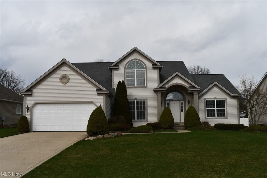 2 story great room. Fully applianced kitchen in stainless steel. Partially finished basement with media room and egress window (700 sq ft). 1st floor primary bedroom with cathedral ceiling. 3 bedrooms upstairs (1 with cathedral ceiling) with loft. Walk in pantry.  Custom, retractable window coverings throughout. Private back yard with established white pines and privacy fence. Concrete patio. Shed. Large 2-car heated, insulated garage. Security system. Whole house water filter, RO, and water softener. Newly painted. New water heater.