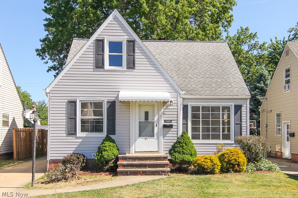 This newly renovated Parma cape cod won't be around for long! The gorgeous interior has a spacious main floor that features a large living room with bright hardwood floors and a large picture window and an updated eat-in kitchen with a stylish tile backsplash, dark wood cabinets and modern gray countertops, plus stainless steel appliances. There are also 2 main floor bedrooms and the full bathroom that has been updated as well with charcoal gray tile tub surround and floors. The finished dormer floor offers 2 additional bedrooms (maybe one for the perfect home office!), each with hardwood floors and there's a large finished basement with family room, convenient half bath and space for laundry and storage! It also has vinyl siding, newer roof, a large rear deck for enjoying the warm summer weather, a detached garage and central air conditioning! This dream home is waiting for you to come fall in love, so schedule a showing today!