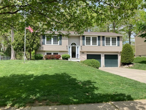 Very well maintained home in Heather Hills. This one owner home has been lovingly cared for. Many quality updates throughout the home. This was originally a 3 bedroom home and could easily be converted back with little effort to 3 bedrooms. The owners wanted a larger owner’s suite which required removing a wall & door. Recently installed in the living room, dining room, kitchen and hallway is gorgeous LVT plank flooring. The bedrooms have carpeting. The most appealing place to relax is in the 3 season sun room that is located off the dining room & has a deck/stairs to the spacious treed backyard. The kitchen had been remodeled several years ago and remains timeless. All kitchen appliances will remain with the home. Both bathrooms were updated several years ago and look great! The lower level has a family room with a gas fireplace. The utility room is located on the lower level and includes the washer and dryer. There are additional cabinets in the laundry area. Vinyl replacement window