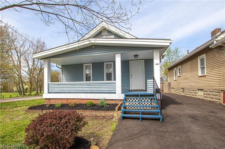 Enjoy a low maintenance yard and views of Calgary Park from both the 20-foot front porch and rear patio. Corner lot is also included! Open first floor features comfort- sized living room with fireplace, natural lighting from picture window, and leads to formal dining room with charming built-in leaded glass cabinets. Quality touches and finishes in kitchen (appliances included) and full bathroom with granite tile bathroom surround walls. Private and sprawling 2nd floor Master Bedroom with exposed brick chimney is the perfect space to wind down. Located in quiet Brooklyn Center, on cul-de-sac neighborhood with no thru traffic and the convenience to I176, I71. Updates on 2019 include: roof, windows, flooring, electric, bathroom, kitchen, driveway, furnace, AC, plumbing and light fixtures. One year home warranty included