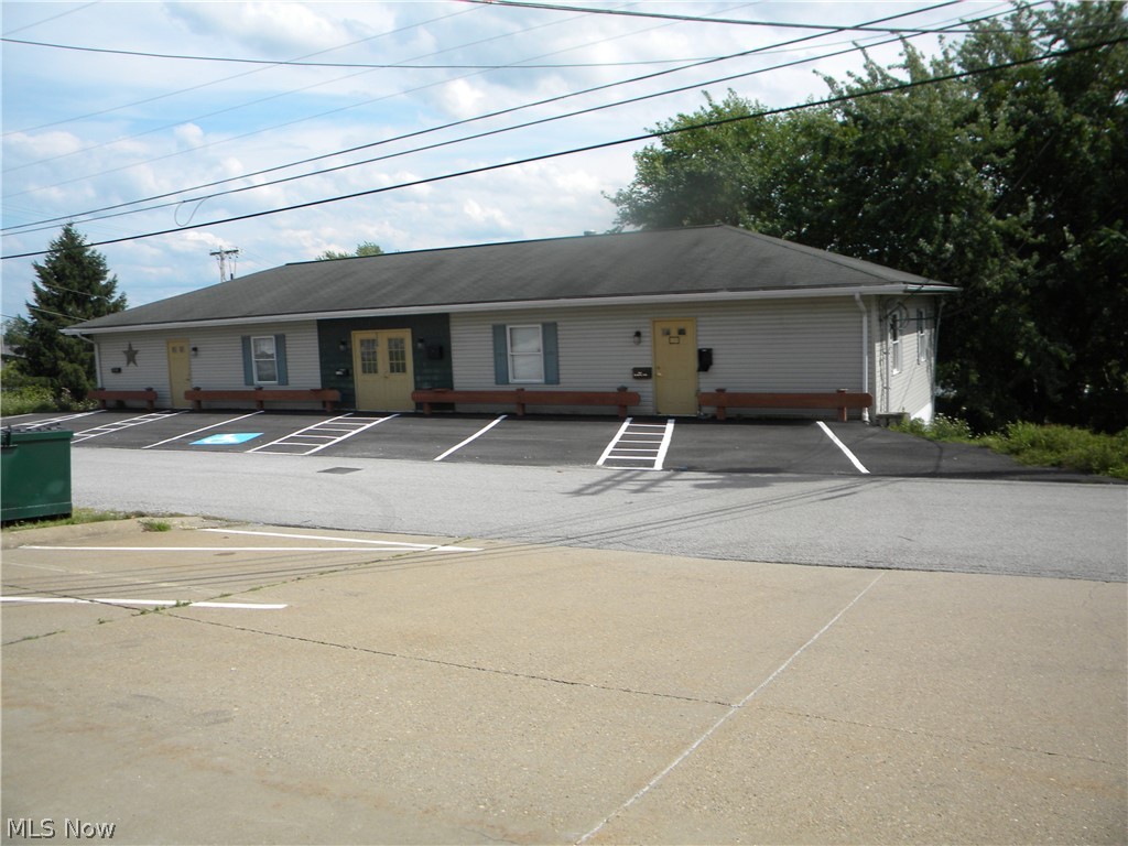 Originally leased as three suites: Full basement was formerly an automotive detail shop leased at $1,000/month. Main floor can be configured as 1, 2 or 3 units. Formerly leased as two units at $2,000/month. Entire building is currently vacant. This property is the final remaining or four nice commercial buildings from the John Jenkins Estate. Recently appraised by the estate at $318,775. The family is asking for offers at this time to finish closing the estate. Don't wait for this opportunity to pass you by!