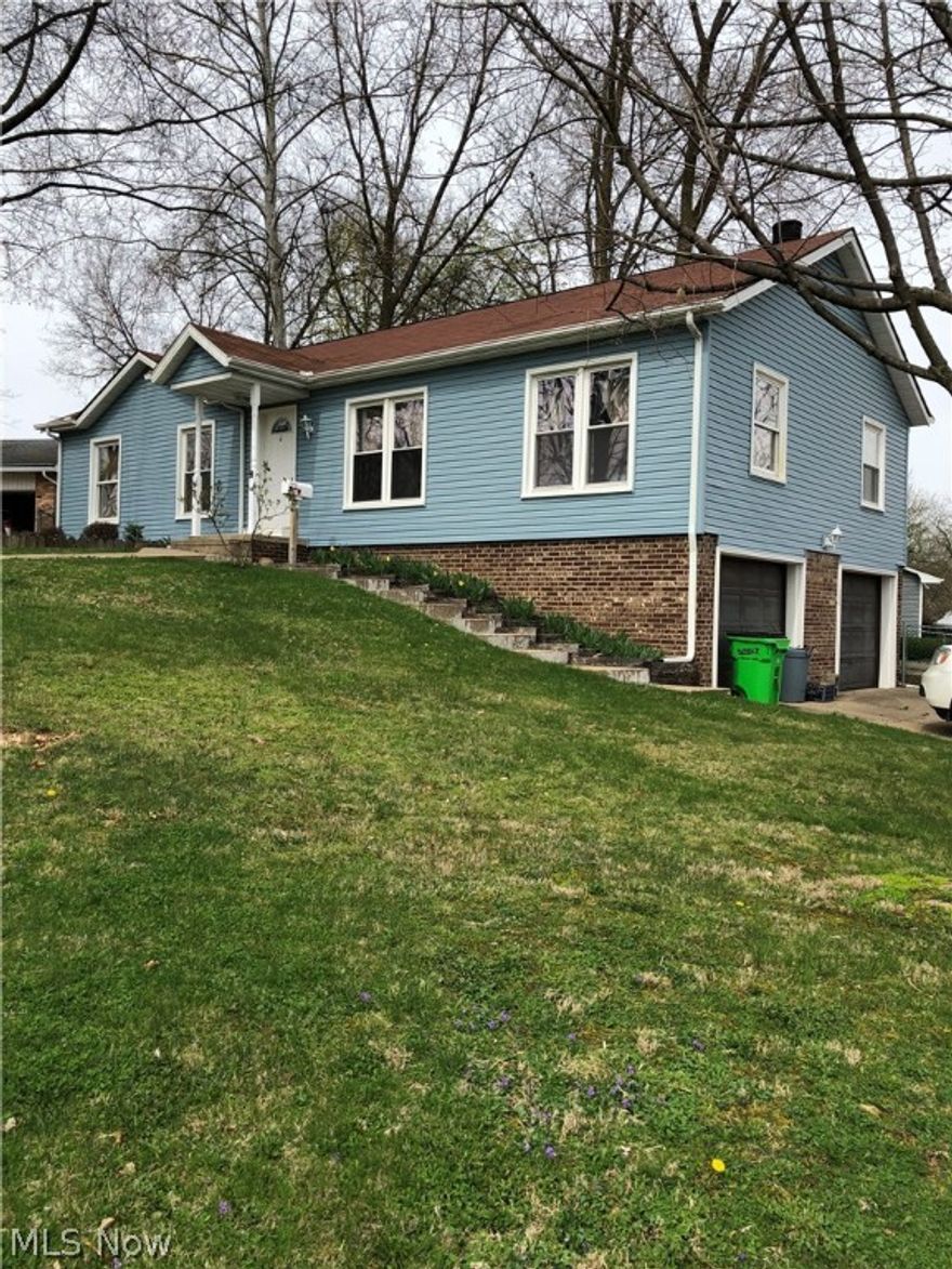 Nice 2/3bdrm, 2.5 bath home with 2 car attached garage.  Fresh paint throughout most of the home.  Current owner was using upstairs as a laundry room but could be used as 3rd bedroom or office w/ half bath.  There is also a laundry hook up in the basement.  Living room is set up for wood stove if buyer prefers.  Newer sunroom and deck at back of house leading out to fenced in backyard.  Immediate possession!