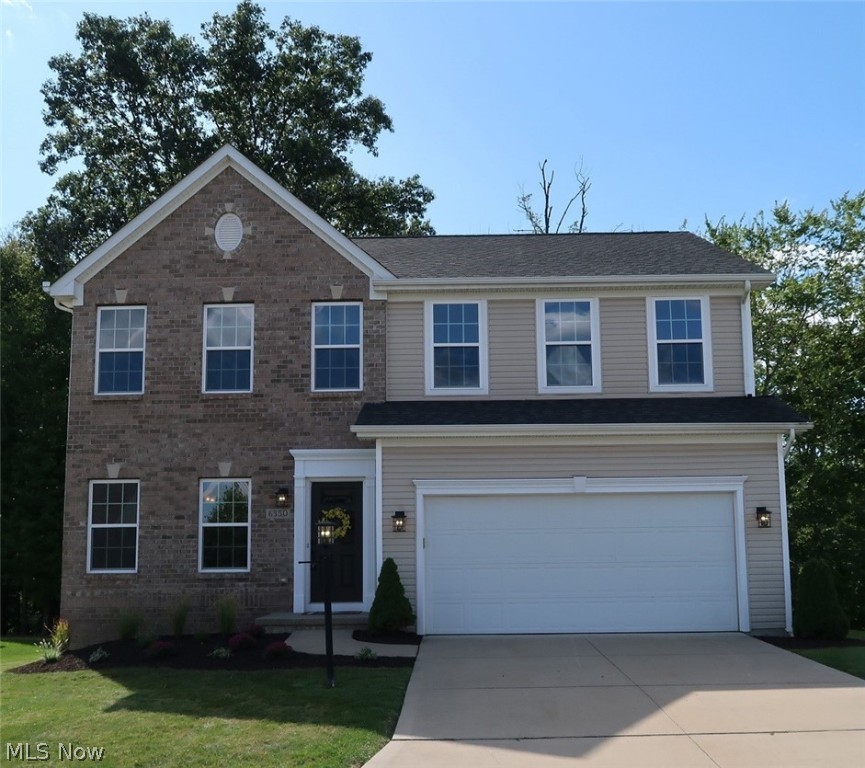 Over 3000 sq ft of finished space in this gorgeous, 2011 built 4 bed, 2.5 bath home in The Meadows of Bedford Heights! Wooded backdrop gives additional appeal to this already stunning, updated home w/ new hard surface flooring throughout the 1st level, all new Samsung stainless steel appliance suite (including gas range & french door fridge), interior lighting, exterior lighting, carpet, paint, tile, faucets, hardware, door knobs, entry lock sets, landscaping & more! The 1st level features 9' ceilings, dining room, huge great room & vaulted morning room off the kitchen w/ bar seating, island & pantry! Morning room exits to the fabulous, refinished balcony deck! Large master bedroom features a massive walk-in closet & adjoining bath w/ separate soaking tub & shower w/ double sink vanity. 3 more bedrooms, big laundry room & hall bath complete the 2nd level. Lower level consists of finished living areas & clean, neat unfinished portion for ample storage. 2 car garage w/ concrete dri