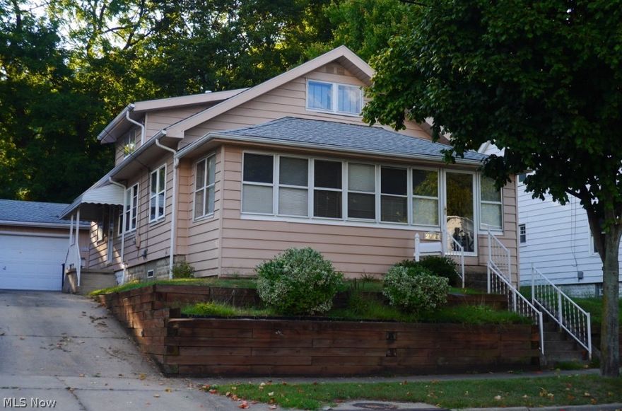 One owner for almost 60 years.  Recipient of Akron's 2008 "Beautification Watch Award".  This 2 bedroom 1 bath Bungalow makes an exceptional statement with the added features of an enclosed front porch with a 90 degree view of the neighborhood.  This property also allows for more private relaxing in the back yard on the raised deck, screened and covered porch.  The basement contains a cedar closet with lots of storage space. The home contains all originally fixtures in good condition. Call and schedule your viewing today!  WONT LAST!!! All offers are considered. Investment opportunity, Motivated seller.
