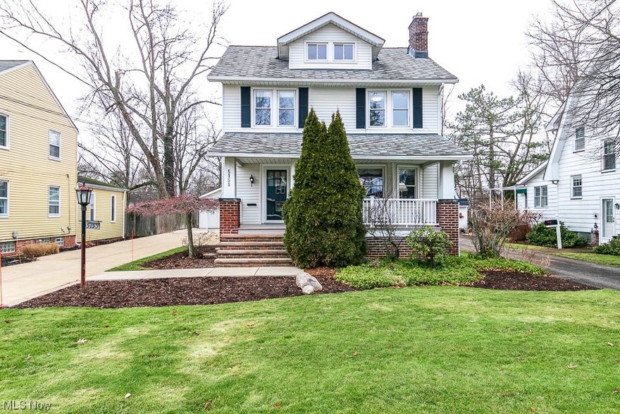 Step into this charming century home nestled in a prime neighborhood, just moments from shops, eateries, and parks! A classic Colonial style welcomes you with its inviting front porch. Inside, the living room boasts crown molding, a bayed wall of windows, and a cozy fireplace framed by marble and built-in bookcases. Gleaming hardwood floors flow into the formal dining room adorned with beautiful woodwork and built-in china cabinets. The kitchen showcases modern stainless steel appliances and a casual dining area with wainscot paneled walls and a picture window overlooking the backyard. Upstairs, three spacious bedrooms share a vintage style full bath with tiled walls and a pedestal sink. The finished attic adds versatility to suit your needs, whether it be for storage or seasonal living space. Outside, enjoy a brick patio and a sizable backyard next to an oversized two-car garage with a bonus workbench! This meticulously maintained home blends quality craftsmanship of the past with today's modern conveniences. 
Don't miss out, call to take your private tour today!