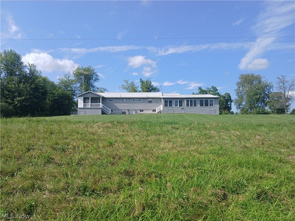 Photo of 1022 Tullis Road, Amesville, OH 45711 (MLS # 5187368)