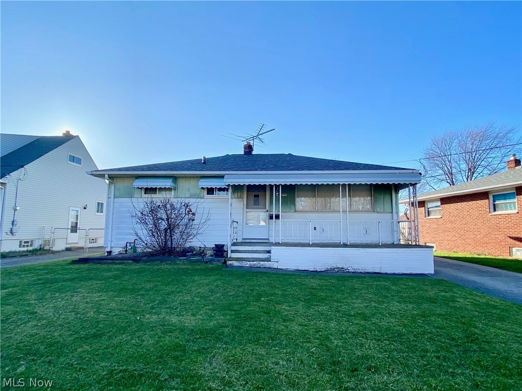 You'll love this quaint ranch home in a quiet neighborhood. From the large front porch to the beautiful fenced-in yard, this house was made to facilitate fond memories for you and your loved ones. Inside, you’ll find a clean and simple style that’s ready for you to make your own. There are two nice-sized bedrooms on the main floor and a large kitchen attached to a formal dining room (Third bedroom is currently being used as the dining room. Bi-fold door and original door can be put back in for bedroom use). All appliances stay. You'll love the full bathroom which features exquisite tile surround and flooring. The 3-month new roof and newer siding on the garage really make this house stand out as a prime option for your next home. You’ll enjoy the abundance of space in the poured concrete basement where you’ll find plenty of storage as well as a finished rec room. Plenty of parking on the long driveway leads back to a 2+ car garage, perfect for storage and protecting your vehicles from