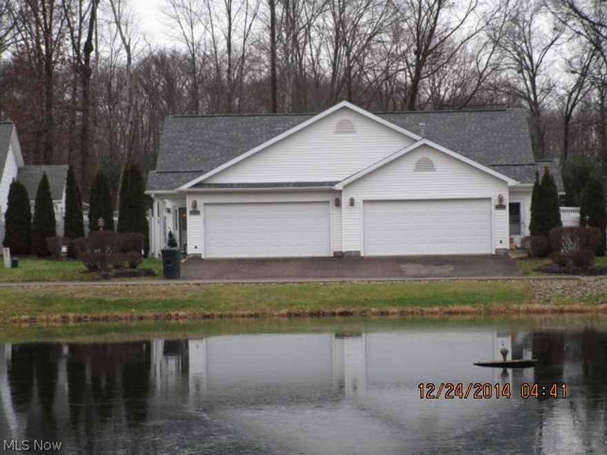 Relax & enjoy Condo life at "The Orchard of Howland".  This 1225 SF Condo has vaulted ceilings and 2 BR's and 2 full baths.  Large master bedroom with walk in closet and full bath with Jacuzzi tub.  Florida room for enjoyment.  Nice view of the large pond.