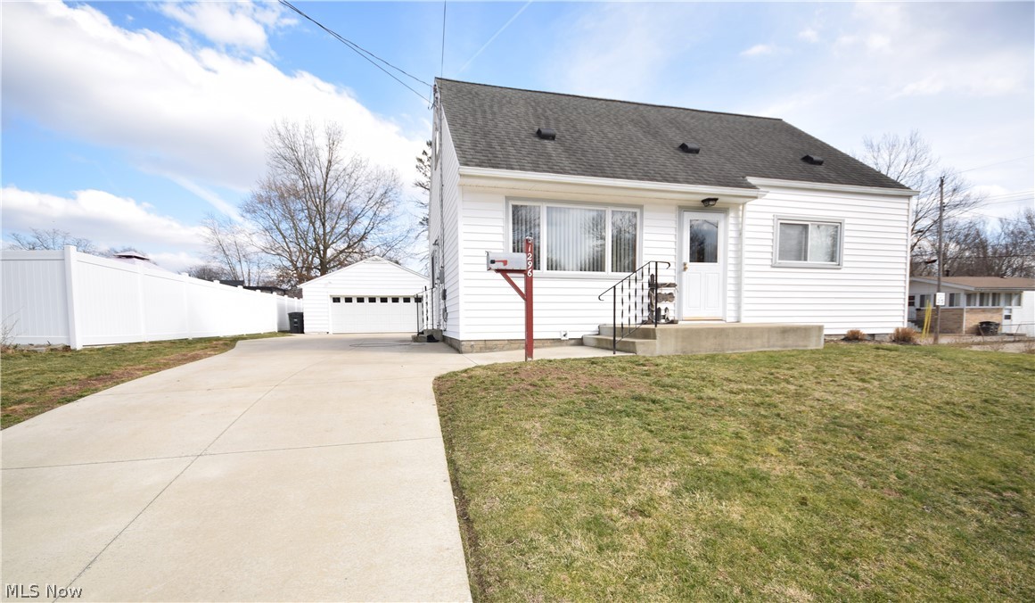 Welcome to 1296 Sarlson Avenue in Akron! This well-maintained home sits on a corner lot and has 3 bedrooms, 1 bathroom. The cozy living room has hardwood floors along with a large picture window overlooking the front yard. In addition to the living room, the main floor is made up of the eat-in kitchen, a bathroom, and two bedrooms. Head upstairs to find an open loft area, perfect for an office, storage space, sitting room -- the options are endless -- along with the third bedroom. The clean basement offers tons of extra space. The spacious backyard is fenced in with trees lining the property. Convenient two-car garage. This home is located near numerous shops and restaurants, the Ohio & Erie Canal Towpath Trail, and also has convenient access to I-76. Don’t let this home get away; schedule your private showing today!