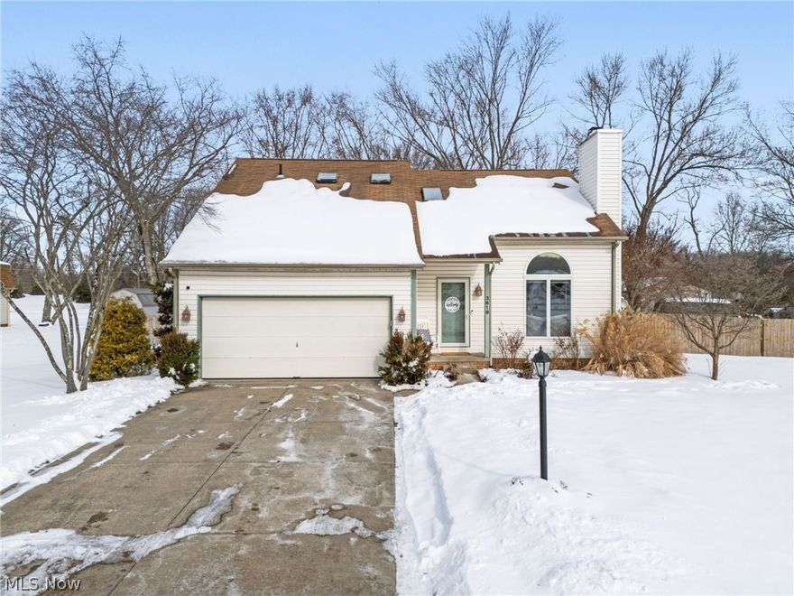 Welcome to 3619 Bunker Hill in Perry Township. This home features an inviting open floor plan, highlighted by a vaulted great room with a wood-burning fireplace and a flexible dining area perfect for hosting guests or relaxing with family. Practical additions include first-floor laundry and a second living space in the family room. The kitchen offers abundant cabinet and counter space, featuring a corner sink that overlooks the fenced-in backyard. Recent updates include LVP flooring and a smart garage door opener installed in 2025, along with a wood privacy fence added in 2022. The master ensuite provides a walk-in closet and a jacuzzi tub for your comfort. Conveniently located near Sippo Lake and its walking paths, this home is serviced by Aqua Water and is a must-see.