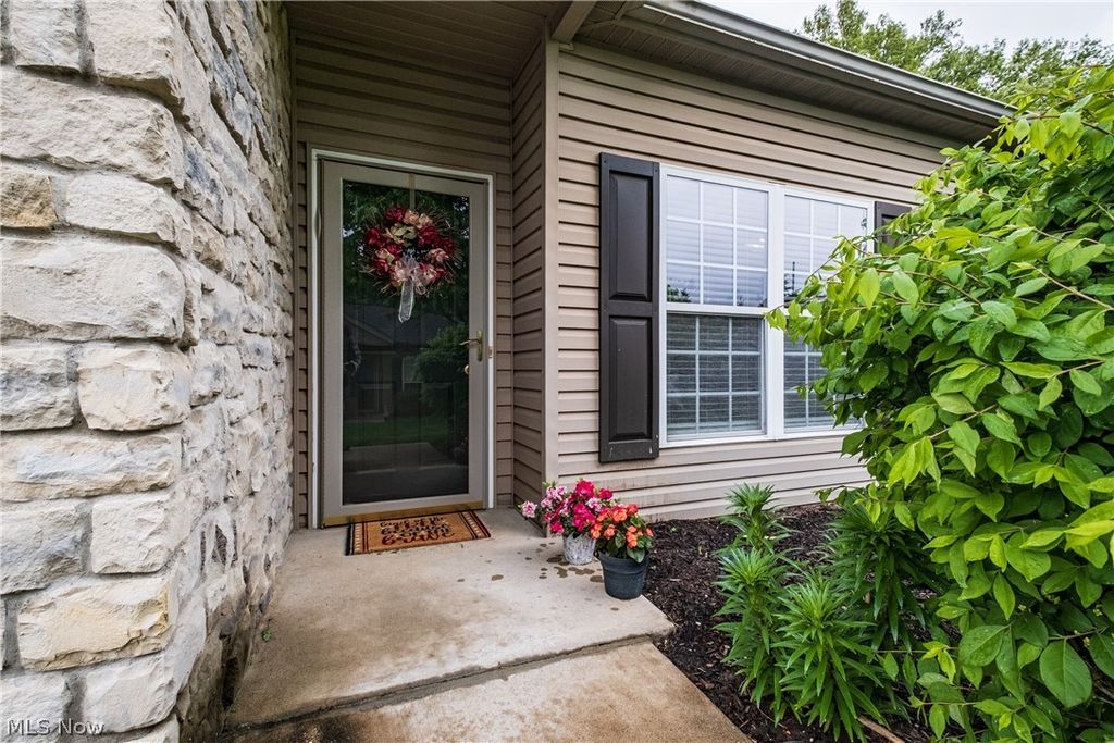 Photo of 1926 University Commons Drive SE, Massillon, OH 44646 (MLS # 5207027)