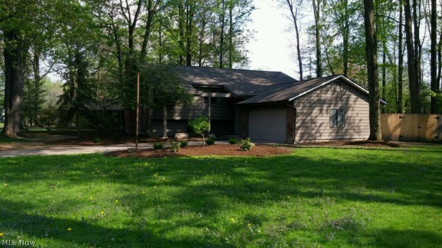 Mentor split level, 4 bedroom, 4 bath (2/2). Completely updated, featuring new kitchen cabinets with stainless steel appliance package, open floor plan spills out to the great room with vaulted ceilings to double French doors covered patio/deck, family room has beautiful fire place with entertainment area, Master bedroom features a walk in shower, office/den/play room, ceramic tile floors throughout and plush carpet, granite in all the right places,. Fenced in back yard with covered porch. New HVAC. Lots of extras.