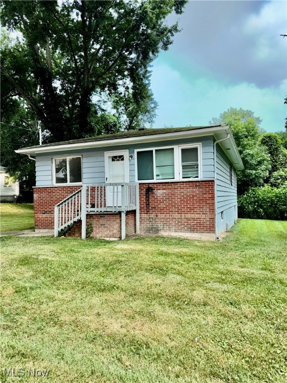 Welcome to 1052 Yukon Ave, Akron, OH, a 3-bedroom, 2-bathroom ranch with endless potential! Conveniently situated near highways, shopping, schools, and more, this home offers both accessibility and opportunity. Featuring a spacious layout, this property is perfect for those looking to add their personal touch. With a little TLC, it could shine as a fantastic starter home or a profitable investment property. Enjoy the ease of single-floor living, a large backyard, and a quiet neighborhood setting. Don't miss this chance to make it your own! Schedule a showing today!