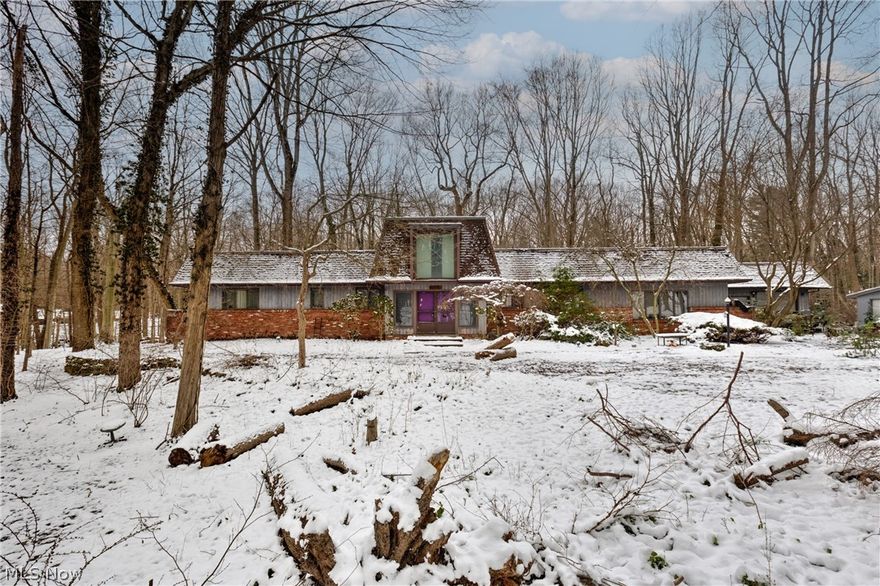 Attention Investors and DIY Enthusiasts! Discover the incredible potential of this home located on a quiet street in Youngstown. This 'Investor Special' is the perfect canvas for your next renovation project or portfolio addition. The property offers a unique layout with a spacious living area and an expansive footprint ready for your creative vision. A standout feature for any hobbyist or car enthusiast is the abundant storage and workspace, including an attached two-car garage, a detached two-car metal carport, and an additional detached one-car garage. Whether you are looking for a fix-and-flip or a long-term rental, the bones and exterior amenities provide a solid foundation for value. Being sold 'As-Is,' this home is priced to move and offers a fantastic opportunity to build sweat equity in a convenient location. Bring your vision—the possibilities here are endless!