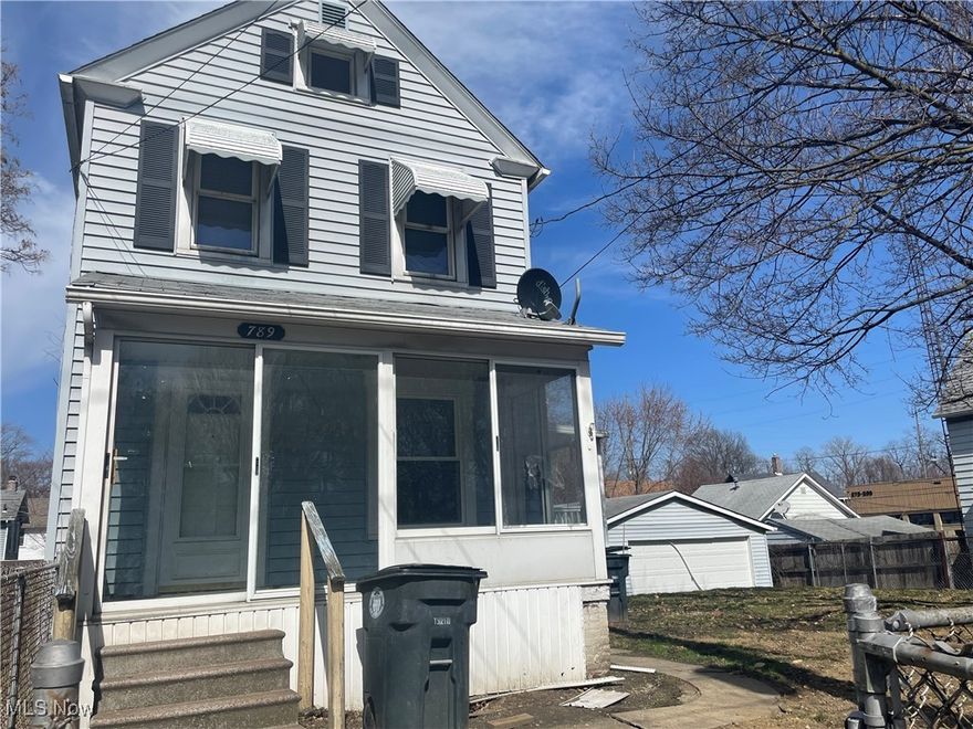 Investment opportunity!  Or ready for the handyman!  NEW two car garage door, newer hot water tank, new furnace, new waterline to street!  The plumbing has been updated!  Newer electric meter installed!  Most of the expensive part of investing is done!  Bring your creative mind and interior aesthetics to this home and it is ready to move in or rent!  Location near hospital, The University of Akron, and expressway!