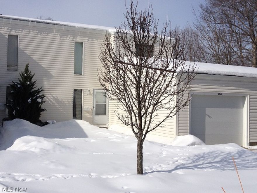 Opportunity is Knocking. Large 3 Bedroom, 1.5 Bath Townhouse Style Condo in Need of some TLC. In Need of Carpet, Kitchen Cabinets and Drywall work But Well Worth the Effort. Open Stair Case. Attached Garage. First Floor Laundry. Convenient to Highways and Shopping.