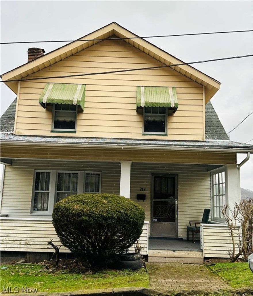 This three bedroom home has so much charm.  When you walk into this home you will notice the beautiful living room and dining room with built in storage throughout the home.  The kitchen has a back porch attached to it where you can sit outside and enjoy the fresh air.  All of the bedrooms are nicely sized and are all upstairs. This home has so much potential. Make your appointment today it won't last long!