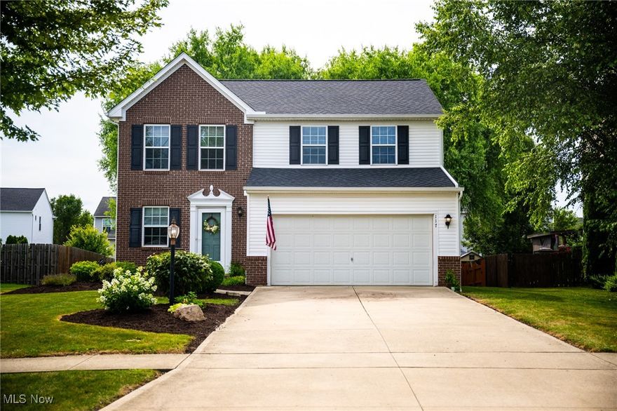 Nestled in the highly desirable Sandstone Ridge development, this beautiful suburban home offers the ideal blend of comfort and style. 

Step inside the upgraded brick exterior to a bright foyer entry, accompanied by a convenient half bath. The spacious great room showcases continuous laminate wood flooring, creating a warm and seamless flow throughout the main living area.
The kitchen is a true entertainer’s dream, featuring maple cabinetry, granite countertops, a large walk-in pantry, and all appliances included.

Sliding doors lead to your private backyard oasis, fully fenced for privacy and ideal for gatherings or quiet relaxation. Soak in summer evenings and crisp fall afternoons on the expansive deck, surrounded by mature landscaping and a beautiful weeping willow tree. A storage shed offers practical space for all of your outdoor essentials.

Retreat to your luxurious and spacious primary suite, complete with an ensuite bath, oversized soaking tub, and modern finishes. A large walk-in closet provides ample storage and comfort.

Two additional generously sized bedrooms, each filled with natural light and equipped with ceiling fans, share a beautifully finished hall bath with a tub/shower combination.

The home also features a spacious unfinished basement, plumbed for a full bath, and ready to be transformed into the perfect rec room, home gym, or additional living space.

Residents of Sandstone Ridge enjoy access to a the Parknoll playground, outdoor fitness center and walking path; and are just minutes from the scenic Metroparks and Rocky River Nature Reserve, offering endless opportunities for outdoor adventure, as well as easy access to highways, medical services, shopping and dining.  

Other notable updates since include:  Roof (2024), Hot Water Tank (2023), Refrigerator (2022), Dishwasher (2024), Garage Door Coil (2022).

Don’t miss your opportunity to make this exceptional home your own!