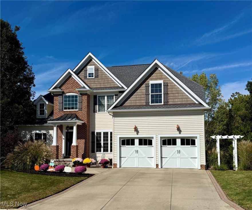 Get the best of both worlds with this hidden gem tucked away on a cul-de-sac in the highly
sought after Woodbrook Place development. You’ll enjoy the serenity of a park-like setting with
an upper deck and lower patio overlooking a beautiful pond, towering trees, and Mudbrook
Creek. Old World Custom Homes outdid themselves with high quality craftsmanship in this
3BR, 3 Bath home. The first floor is breathtaking as you walk into the 2 story foyer, leading to an
open and airy greatroom, nicely appointed kitchen, and dining area that overlook the woods,
complete with a fireplace, and Spanish hickory wood floors. The tasteful first floor master suite
has a tiled shower, luxury bathtub, and walk-in closet with custom wood cabinets. A laundry room, a full guest bathroom, and a distinguished office or den with board and batten paneling
finish out the first floor. Upstairs, you will find a roomy loft, two bedrooms, a Jack and Jill
bathroom, and a large closet plumbed for a second washer and dryer. The lower level boasts a
partially finished walkout basement with a spectacular stone fireplace and an abundance of
Pella windows to enjoy the view. Other unfinished areas are ready for storage or adding more living space. Hop in your car and arrive at Portage Crossing, downtown Cuyahoga Falls,
Blossom Music Center, Merriman Valley, or the Cuyahoga Valley National Park in a matter of
minutes!  Enjoy the added bonus of a brand new roof installed in Aug 2023!