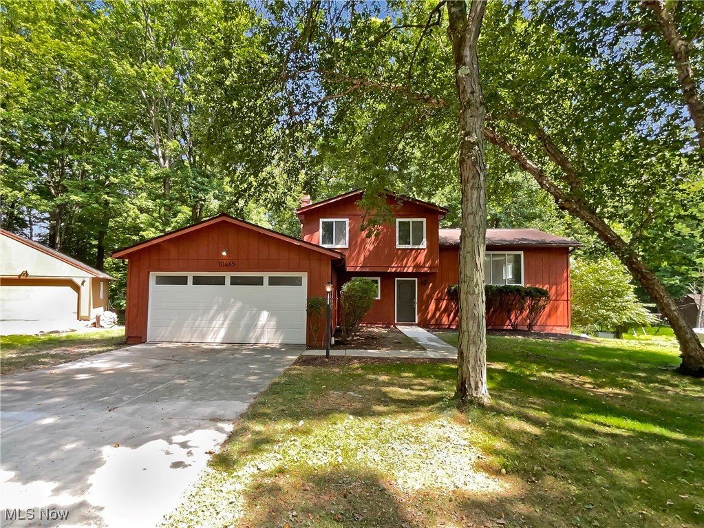 Tucked on a quiet cul-de-sac in desirable Twinsburg, this 3 bedroom home offers a comfortable split floor plan and a peaceful setting surrounded by mature trees. Fresh interior paint, new flooring, and neutral finishes create a welcoming atmosphere throughout. The kitchen features stainless steel appliances, while the lower level boasts a cozy fireplace and two bonus rooms that provide flexible space for a home office, hobby room, or area. Outside, enjoy a private fenced backyard perfect for relaxing or entertaining. With numerous recreation amenities and parks just minutes , this move-in ready home offers both comfort and convenience in a desirable location.. Included 100-Day Home Warranty with buyer activation