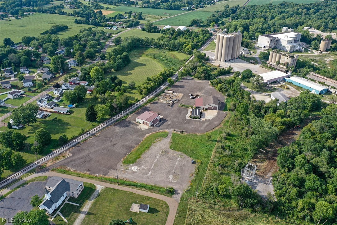Exciting Auction Opportunity - Industrial Business Complex On 7.89 Acres - Stark County – Plain Township - Three Buildings, 16,000+ SF Total – Shop Areas – Service Bays – Offices - Loads Of Parking And Asphalt Yard Storage - Zoned General Industrial - 925' Of Railroad Frontage - On-Site And Online Bidding Available - Owners have sold the business. ABSOLUTE AUCTION, all sells to the highest bidder. ONLINE BIDDING BEGINS TUESDAY – AUGUST 30, 2022 – 12:00 PM and AUCTION LIVE ON-SITE BIDDING WILL BEGIN FRIDAY – SEPTEMBER 2, 2022 – 12:00 PM. What an opportunity to purchase a “turnkey” industrial complex. This property is ready for a new owner to move in and start using. Everything has been well maintained by the seller who ran a successful business for many years. With 6.227 acres total there is plenty of parking or on-site business storage with room to expand. Total real estate taxes are approx. $5,031 per half. Take advantage of this opportunity. Sold as an entirety. The property will be