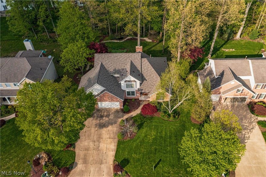 Wonderful Skip Rea built 4 Bedroom located in the heart of Jackson TWP close to shopping, schools, park and restaurants. Well maintained with many updates over the past few years. The 2 story Great room is the focal point and is open to the Eat In Kitchen which boasts ample storage, granite counters and Center Island. The first floor Owner's Bedroom and Bath is tucked away and is accented by an abundance of light. Recently finished Lower Level adds additional living space including a large Rec area, Family/Media area/5th Bedroom(with egress exit) and 3rd Full Bath. Enjoy entertaining on your tiered deck overlooking the wooded backyard.