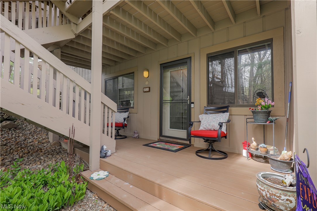 Welcome home to 588 Meredith lane in the desirable Pine Mill Ridge development in Cuyahoga Falls! This two bedroom, 2 full bath condo is an end unit with a panoramic view of nature and all of the beauty that comes along with it. There are oversized windows throughout the unit allowing you to enjoy the view and the creek below, don't forget you get to enjoy a covered oversized private patio on these beautiful spring days ahead! In this condo you will enjoy two entertaining spaces, a eat in dining area that is open to all of the entertaining spaces. The kitchen has been tastefully updated with beautiful granite with bar stools. Both bedrooms are generous sizes and both bathrooms have granite countertops installed as well. New carpet has been installed and its ready for you to make this your new home! The sale of the condo includes an oversized detached garage. This condo does include access to the community pool to enjoy on the upcoming hot summer days! The location is fantastic as you are so close to everything Cuyahoga Falls has to offer. Schedule your private showing today - this unit is truly one of a kind, do not delay!