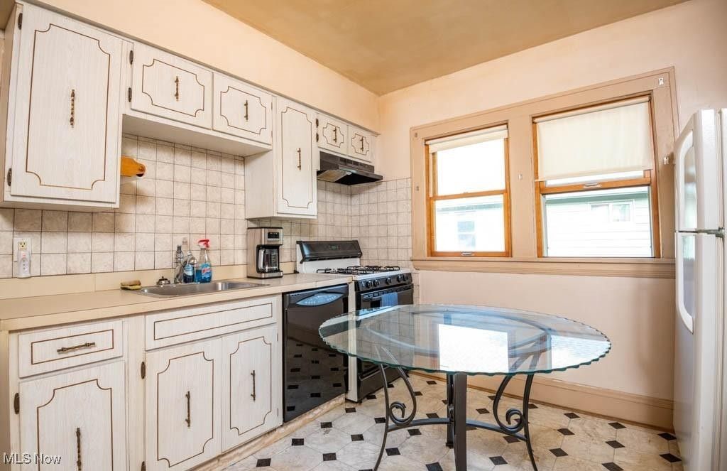 Photo of 14510 Granger Road, Maple Heights, OH 44137 (MLS # 5184629)