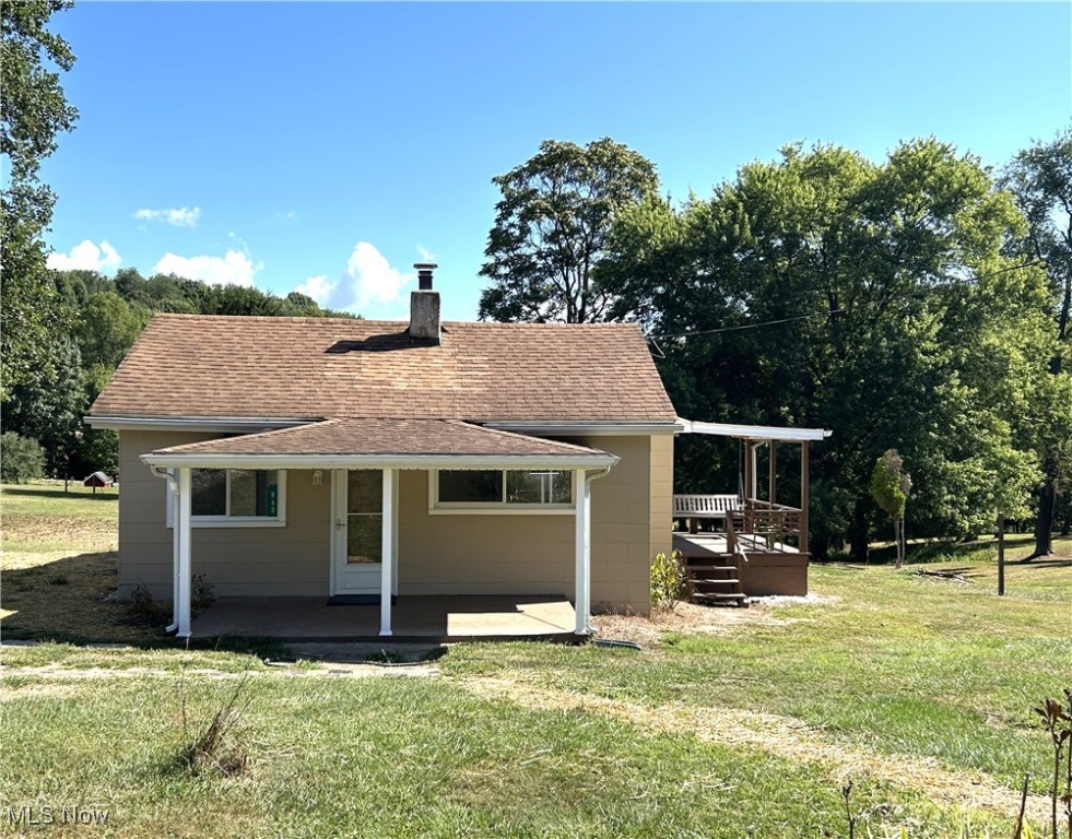 Don't miss this charming 3-4-bedroom ranch home with an oversized 2-car garage sitting on over a half-acre of land! Step inside to find fresh updates including new flooring, fresh paint, and a nicely updated bath. The home is flexible to fit your needs - use the 4th bedroom for laundry or easily move it to the basement and enjoy the extra room. The full basement gives you endless storage options. Outside, relax on the side porch while you take in the peaceful views and enjoy the wildlife. The garage is perfect for cars, toys and hobbies. All this with the perfect location-quiet country setting, yet just minutes from town.