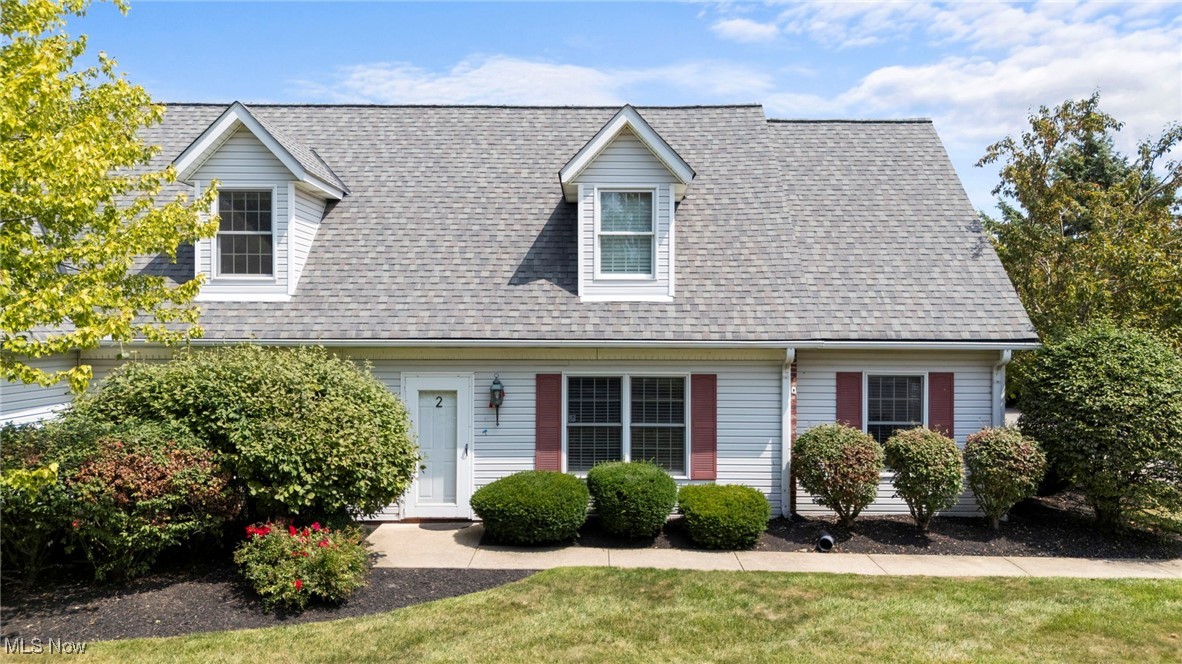 Welcome to this stunning 3 bedroom, 2 full bath Cape Cod condo, ideally located near the shores of Lake Erie. Step inside to discover a spacious and inviting vaulted great room, seamlessly connected to a formal dining area, creating an open and airy flow throughout the main level. The heart of the home is the beautifully renovated eat-in kitchen, featuring ample counter space, gleaming granite countertops and modern, high quality appliances - all included with your purchase. On the main floor, you'll find the convenience of a laundry room and the added bonus of a large, attached two-car garage. The first floor primary suite is a true retreat, offering two closets (including a generous walk-in) and a luxurious en suite bath with walk-in shower. Upstairs, you'll find a versatile loft area perfect for a home office, along with two nice sized bedrooms, each offering large closets for plenty of storage. These bedrooms share a full, well-appointed bath. The home features newer flooring throughout most of the space, providing a fresh and modern feel. With neutral paint colors and tasteful upgrades, this condo is move-in ready and exudes a contemporary charm. Don't miss the opportunity to make this beautiful home your own!