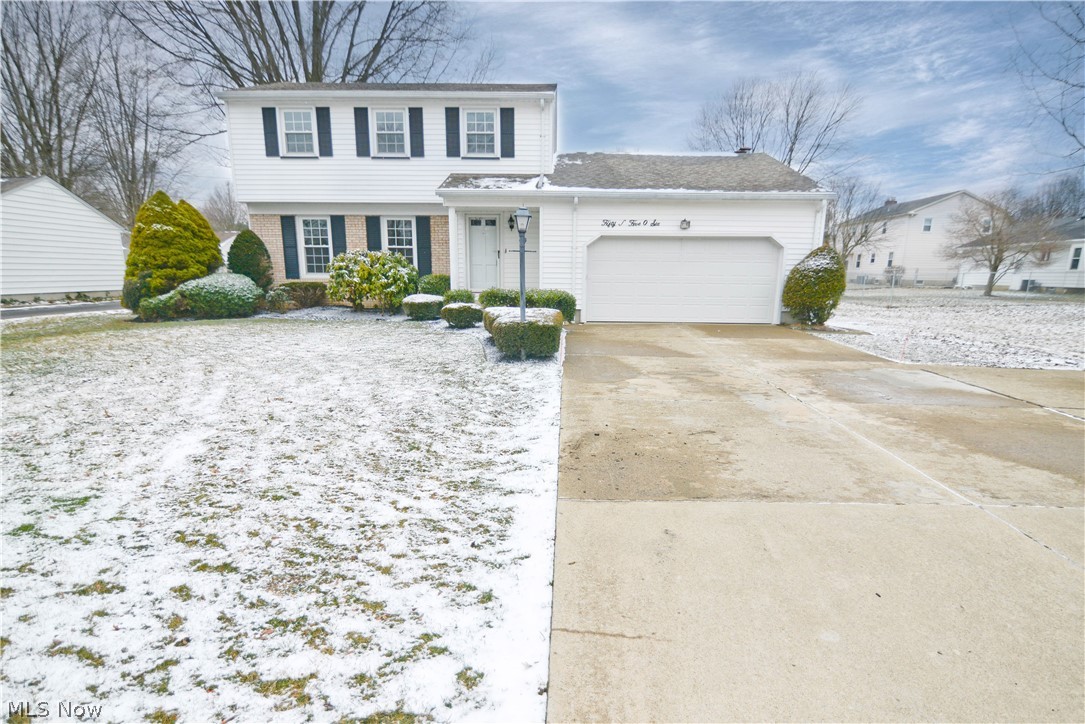 Talk about nothing to do!!! All freshly painted. Updated flooring. Newer vinyl tilt in windows. New kitchen counters, backsplash, flooring and all new stainless steel GE appliances. All bathrooms have new vanities with Corian counters, new commodes, new mirrors and new lights. Family room has wood burning fireplace and beautiful HW floors. Enclosed porch off the family room with new indoor/outdoor carpet and sliding glass doors. Upstairs all bedrooms have brand new carpet with HW floors underneath. Updated elec panel 2/2020. Separate commode and sink in the basement and a drain for a shower to be installed. 3 good size bedrooms, lot's of closets. 2 full and 2 half baths.