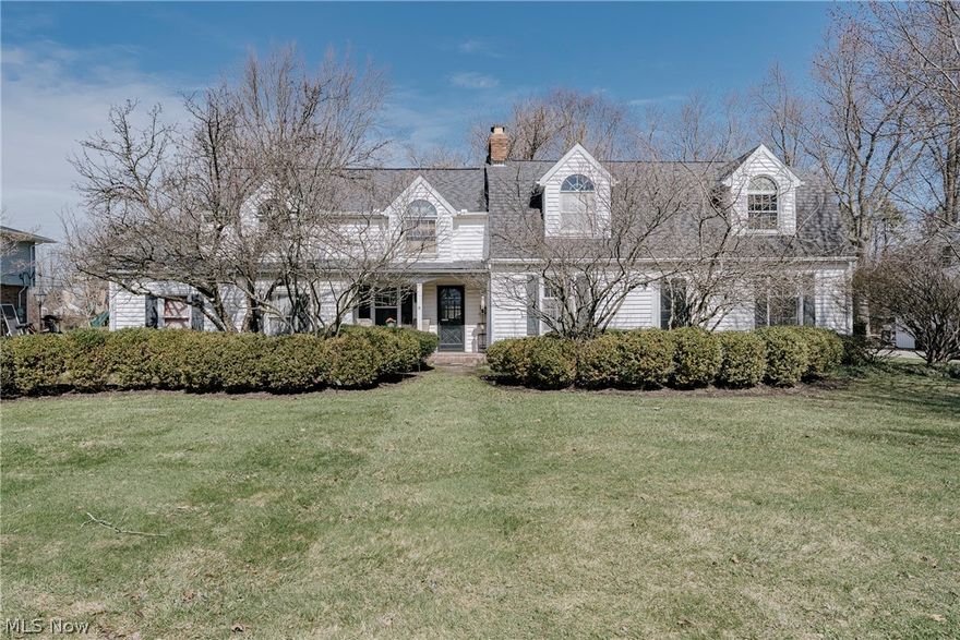 Welcome to 26301 Annesley Rd – A Spacious Colonial in a Highly Sought-After Beachwood Neighborhood! This beautifully designed home offers exceptional space and versatility, perfect for both everyday living and entertaining. A welcoming foyer with hardwood flooring sets the tone, flanked by a sun-filled formal dining room and a private office that connects seamlessly to the kitchen. The generously sized kitchen features tile countertops with matching backsplash, abundant cabinetry, a full suite of appliances, and a striking two-sided brick fireplace that flows into the inviting family room. The family room also offers a second front entrance, sliding door access to the backyard, and connects to an L-shaped mudroom/laundry area with access to the attached garage. At the rear of the home, a huge living room showcases wood floors, an elegant fireplace, and plenty of natural light, along with direct backyard access. A convenient half bath completes the main level. Upstairs, you’ll find four spacious bedrooms, including a primary suite with a walk-in closet and an ensuite bath featuring a skylight and double vanity. Additional bedrooms offer generous closet space, along with a second full bath and a versatile loft area. The nearly fully finished basement adds incredible living space with a kitchenette, full bath, bonus room, and a large L-shaped recreation area, plus storage/utility rooms. Enjoy the outdoors in the huge, fully fenced backyard featuring a patio, multiple seating areas, mature trees for privacy and shade, a shed, and a hot tub—perfect for relaxing or entertaining. A rare opportunity to own a spacious, well-appointed home in one of Beachwood’s most desirable locations!