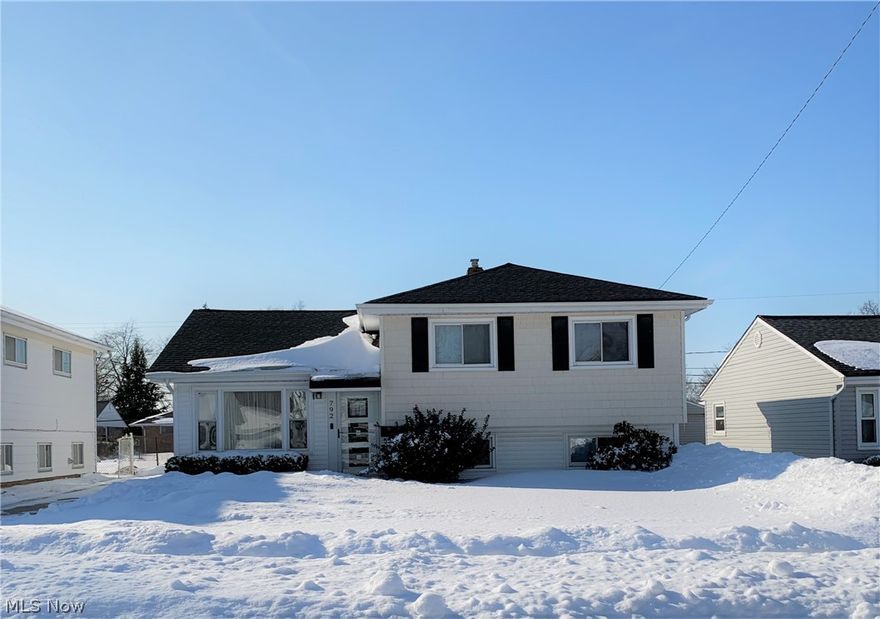 Great location & move in ready! This home is located on a quiet street and is close to all amenities: grocery stores, parks, highway, downtown Cleveland and more. You will enjoy a fully fenced in yard perfect for kids and/or pets, 2.5 car garage with electricity and a man door, a covered patio and a nice fire pit. There is also plenty of parking on your nice concrete driveway and street. This home is perfect to host your summer gatherings with friends and family! The kitchen was beautifully remodeled and includes newer stainless steel appliances, granite countertops and a breakfast bar. One of the best features as you enter the home are the vaulted ceilings, which give a classy and modern feel to the floor plan. The home also has modern ceiling fixtures and fans throughout. The main bathroom has a beautiful double sink vanity with granite top, two medicine cabinets with in/out mirrors and good shelving space. The bathroom floor has modern ceramic tile and the tub enclosure is also tile