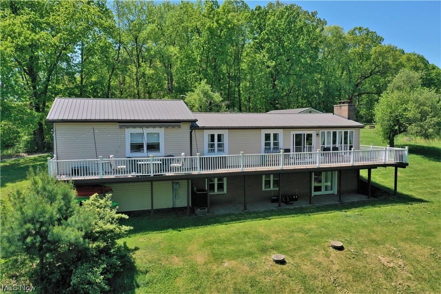 "Life is better at the Lake" is the phrase heard often here. Relax and take in the lake view and countryside from the deck of this newly updated 3 bedroom, 2 bath home. The oversized master bedroom offers a large walk-in closet and an additional side room for your tanning bed, exercise or yoga room. The kitchen was updated in 2018 and the living and dining rooms were updated in 2020. This home features a 4 bay detached/attached garage where there is plenty of room to store all of your lake toys. Enjoy the 150 acre private lake and all the amenities that go with it, boating, fishing, swimming, the beach, archery range, driving range and if you don't feel like cooking, stop in at the marina restaurant. Call now for your chance to live better at the lake.