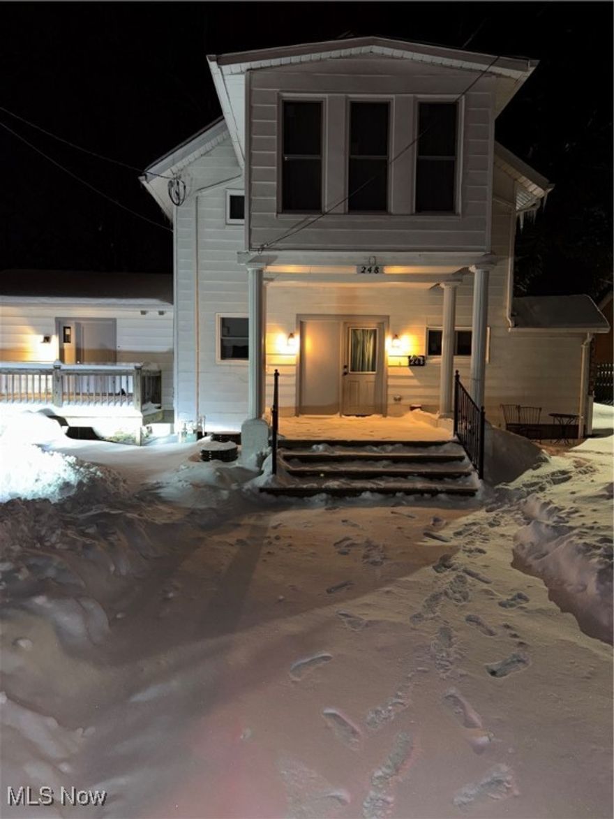 Welcome to this beautiful home in Painesville, where classic charm meets modern design. Step through the front door into a stunning, updated kitchen that flows seamlessly into a wide-open floor plan. The kitchen features brand-new white shaker cabinetry, granite countertops, and a spacious center island—perfect for gathering with friends and family. Just beyond the kitchen, you’ll find an expansive living room highlighted by a wood-burning fireplace and custom built-in cabinetry. A convenient first floor half bath is located just off the living area. The primary suite offers a private full bathroom and direct access to a perfect size deck, an ideal spot to enjoy your morning coffee. Upstairs, two oversized bedrooms showcase unique vaulted ceilings, along with two full bathrooms and a second-floor laundry room for added convenience. The fourth bedroom, located above the porch, is filled with natural light from its large windows. Truly one of a kind, this exceptional home offers space, style, and thoughtful updates throughout. All Appliances Included! Brand new carpet in living area. This home is ready for its new owners!!!!!