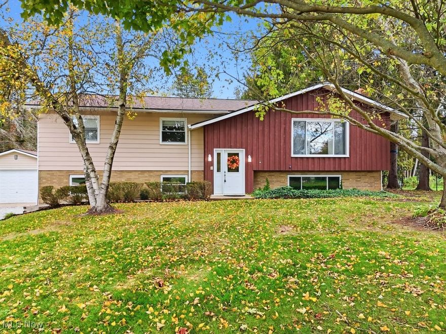 Welcome home - move in ready! Great location in the center of Green. Lovely 3 bed/2.5 bath bi-level home on .64 acres which backs up to Mirror Lake. Spacious backyard with mature trees and an oversized 2 car detached garage. Attached 2 car garage is heated. There is access to backyard from both levels. Main bedroom has a half bath and plenty of closet space. Additional office/4th bedroom in basement, and a craft room. Tons of updates including - newer kitchen appliances 2017, newer vinyl windows, electric service and panel 2023, roof 2022, pressure tank and well pump 2021. Call today!