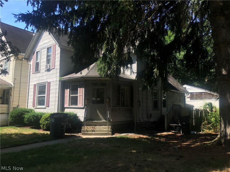 First floor unit (does have three steps to enter in front and back). Enter into a enclosed front porch, which leads into a foyer of the apartment. There is a freshly painted living room, two bedrooms with closets, a bathroom, large kitchen with space for a deep freezer if desired, and dining room. There is a shared garage in back which could be use as a work space, or storage of work equipment, or small items. There is also a shared basement.